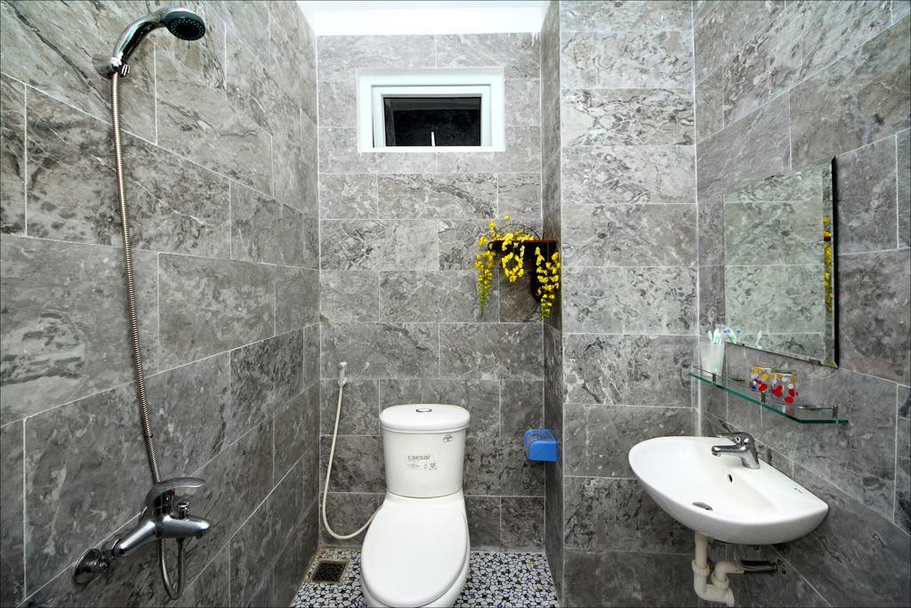 Center Homestay Хойан Номер фото